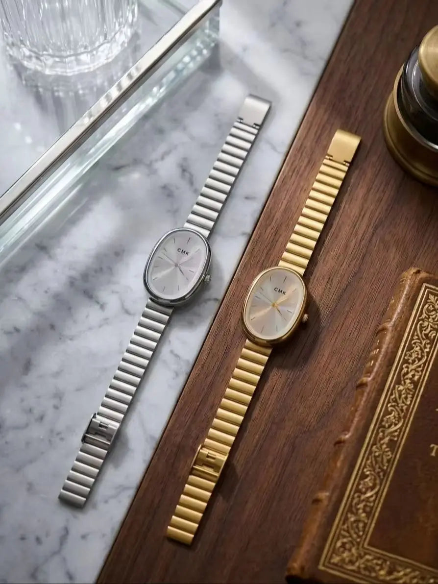 Oval thin steel strip women's quartz watch gold and silver minimalist luxury commuting watch Qme