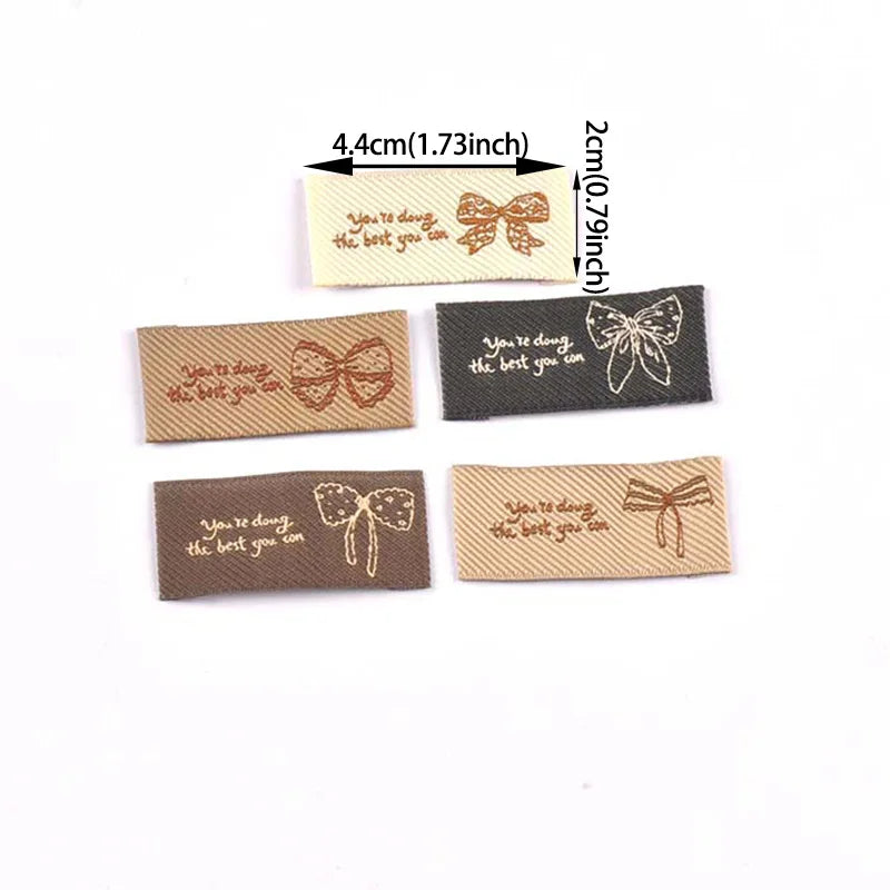 30pcs 44x20mm White/Black/Coffee Knitted Bow Label DIY Sewing Crafts Clothes for Headwear/Clothing/Shoes/Bags cp3841 Qme