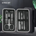 A Set of Stainless Steel Grooming Tools in Black, Including Nail Clippers, a Cuticle Pusher, Perfect for Portable Nail Care Qme black