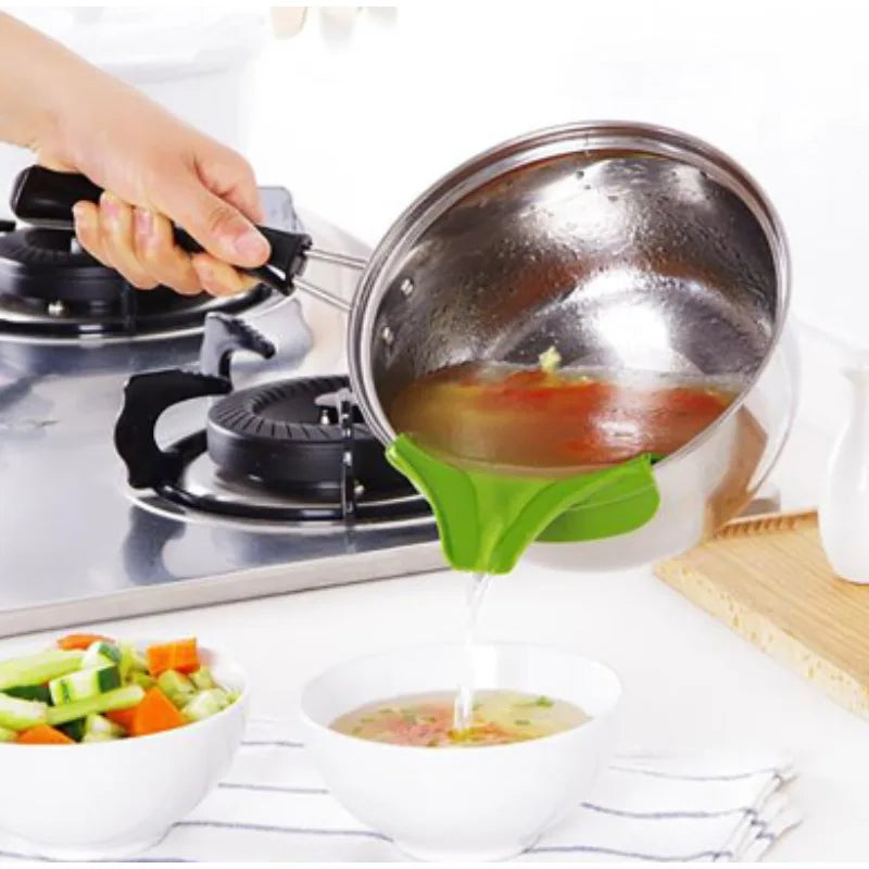 Kitchen Tools Designed to Prevent Spills, Including Pots with Round Openings, Edge Guards, And Various Small Kitchen Gadgets Qme