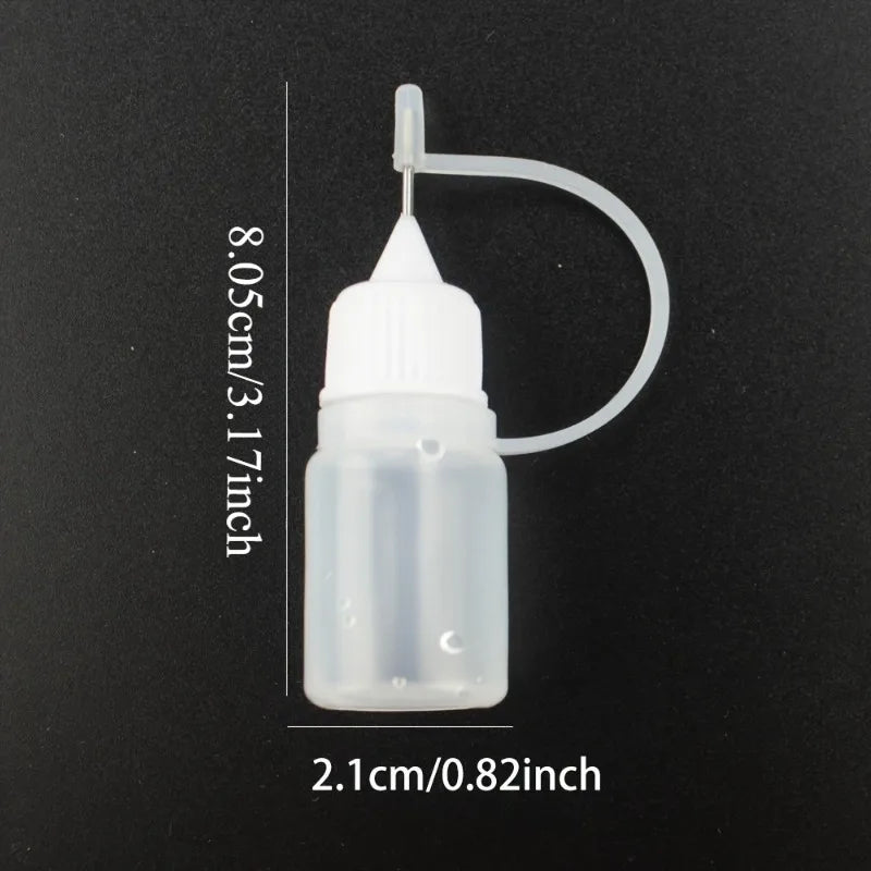 Plastic squeezable bottles, dropper bottles, ink bottles, glue bottles, dispensers, colored bottles, squeeze-fill bottles Qme