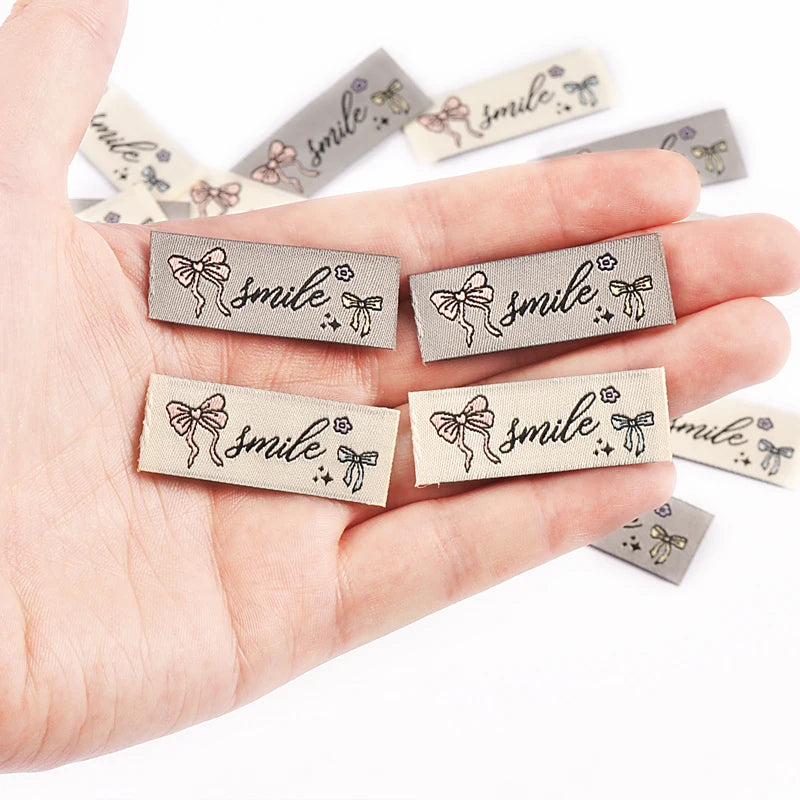 50pcs 15x40mm bowknot Rectangular Embroidery Label For Clothing Bag Decoration Accessories DIY Handmade Sewing Supplies cp4180 Qme