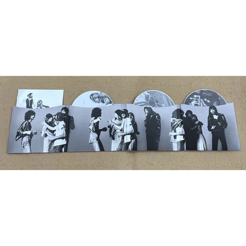 Rock Music CD Album with Retro Black-and-White Couple Silhouette Cover Elegant Design & Classic Tracks Creating A Nostalgic Vibe Qme