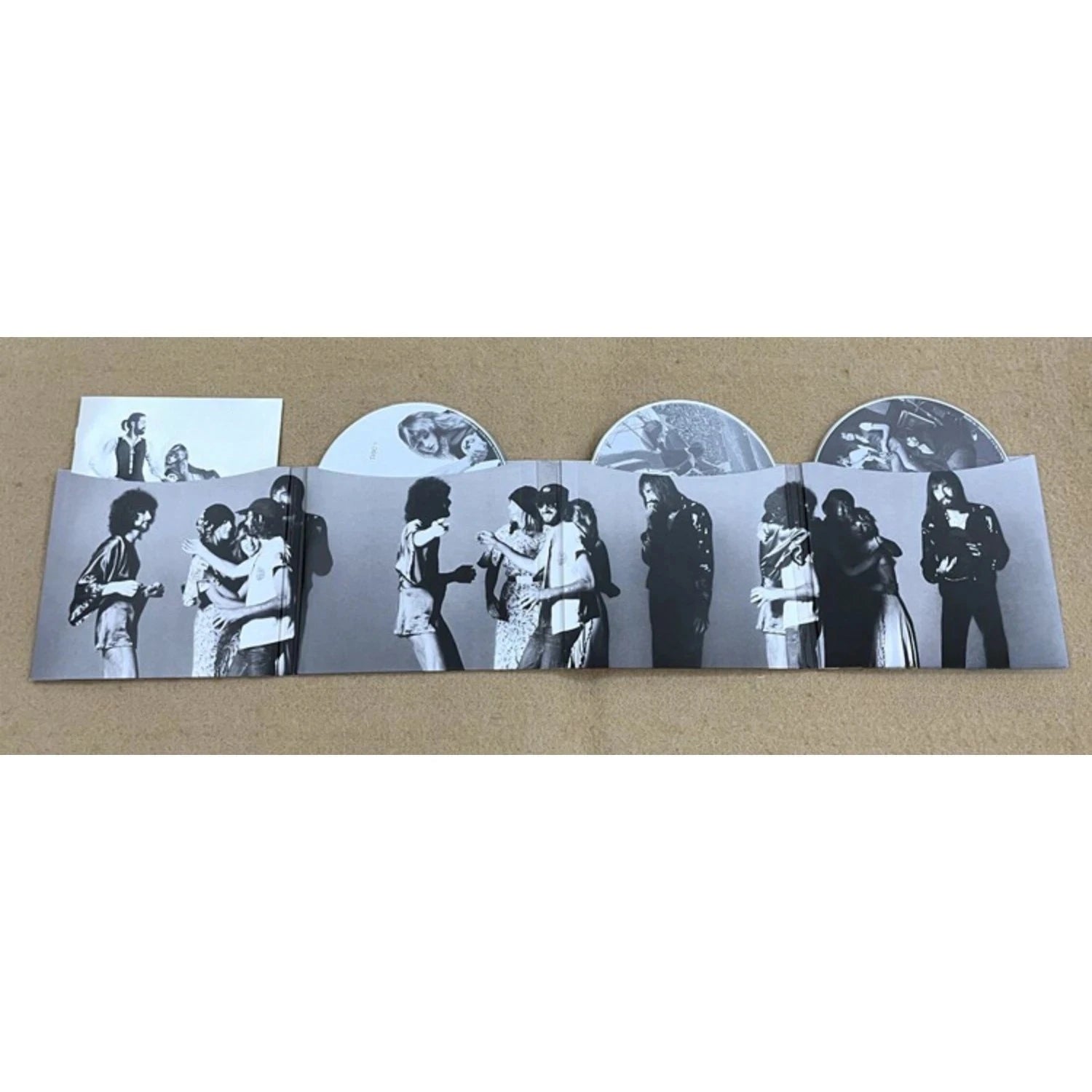 Rock Music CD Album with Retro Black-and-White Couple Silhouette Cover Elegant Design & Classic Tracks Creating A Nostalgic Vibe Qme