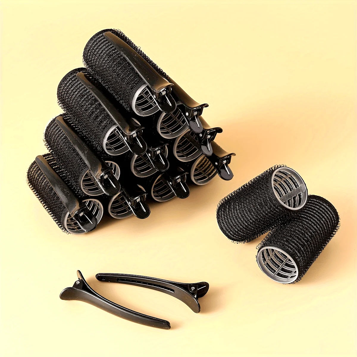 Self-adhesive hair curlers and clips set, consisting of 12 self-gripping curlers and 12 crocodile skin curling clips. Qme black