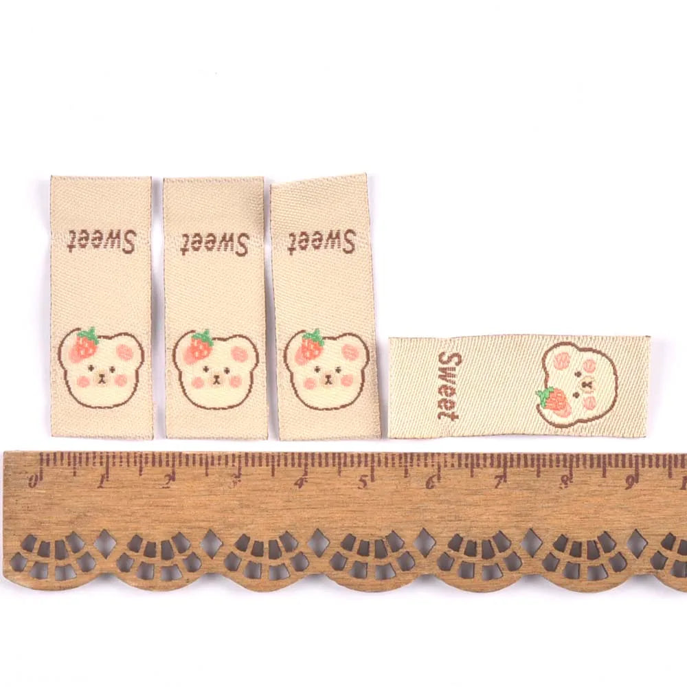 50Pcs Lovely Bear Sweet Labels For Sewing Accessories Kid Garment DIY Crafts Clothes Handmade Supplies Decorative Tags c3576 Qme 1