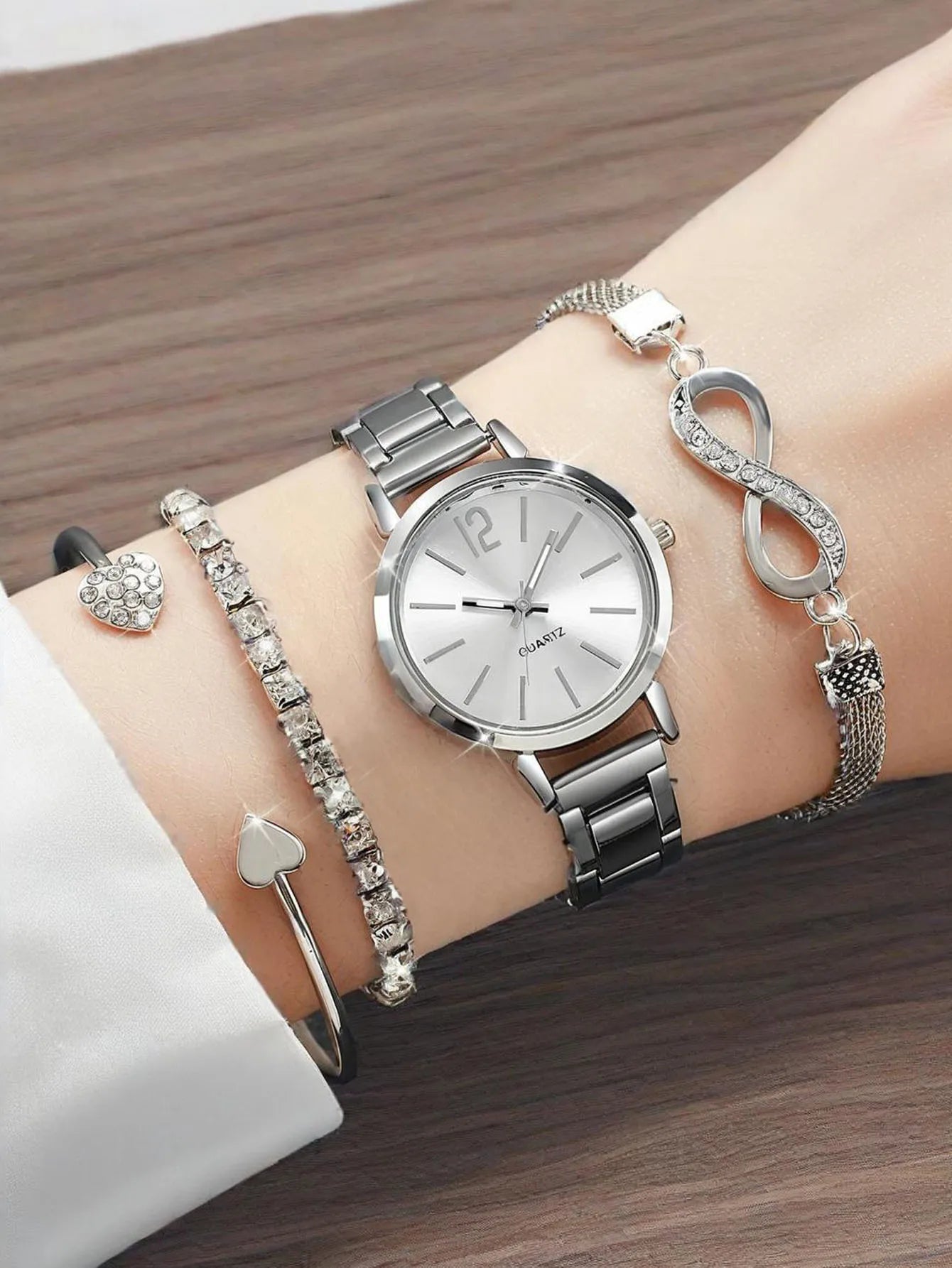 4pcs /set women's watch temperament steel strip women's watch fashion simple trend women's quartz watch bracelet set Qme