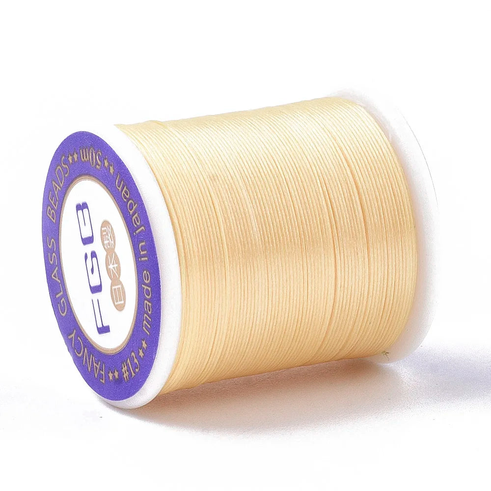 PandaHall 50m/Roll Multi-Color Nylon 66 Beading Thread, 0.1mm High Strength Stretch Resistant for Seed Bead Jewelry Making Qme Champagne Yellow