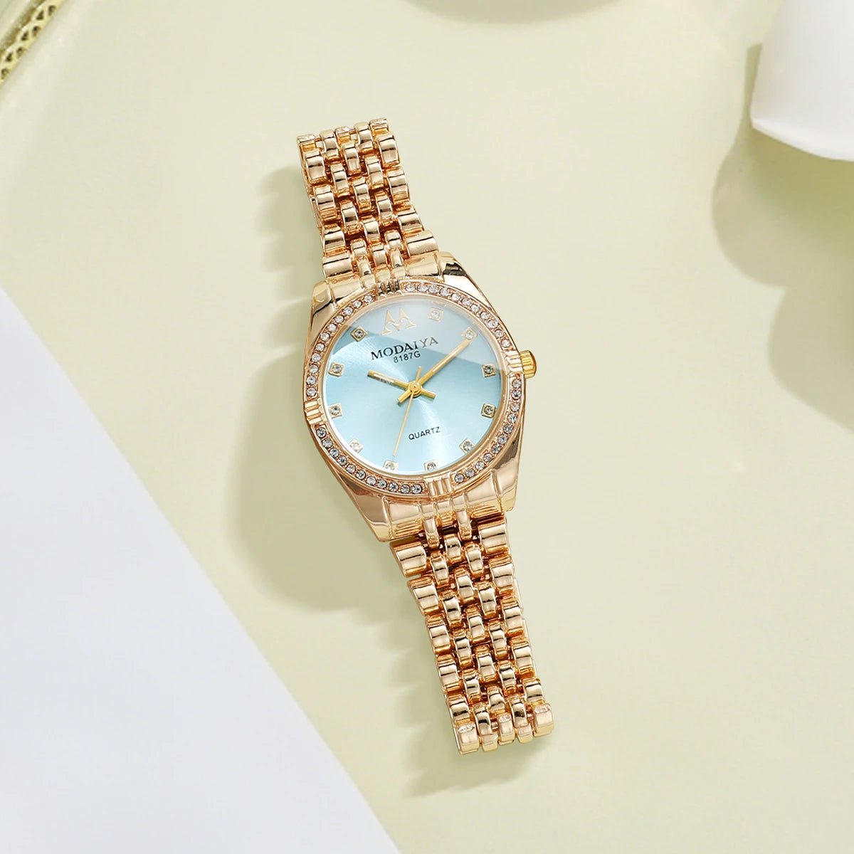 Luxury Women's Quartz Watch, Rose Gold Tone with Crystal Bezel, Light Blue Dial, Elegant Style Qme