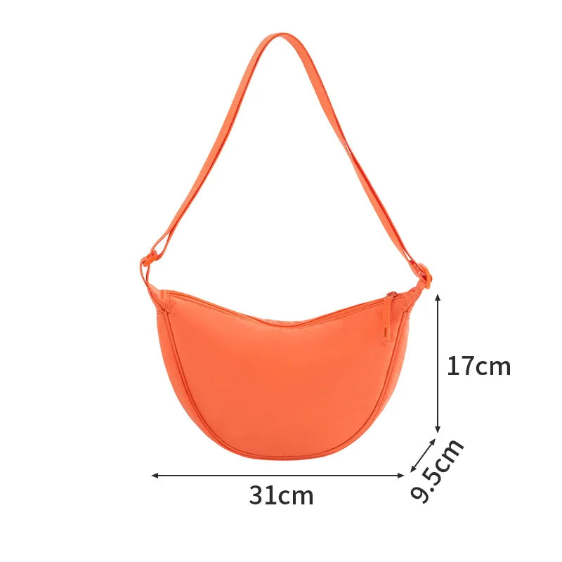 A New Nylon Crossbody Bag for Women Designer Large Capacity Portable Lady Simple Commuter Underarm Bag Fashion Moon Shoulder Bag Qme Orange Trumpet