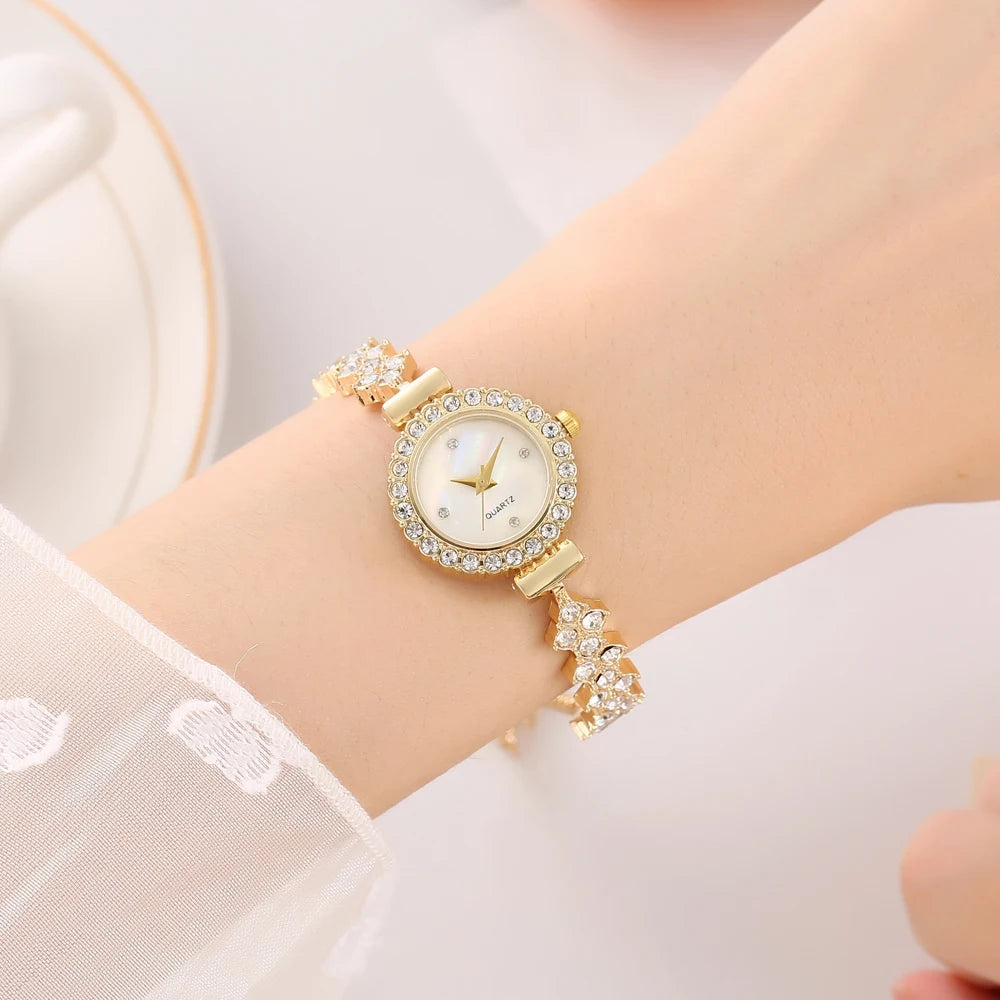 New niche fashion diamond inlaid women's watch round full diamond women's style pull-out bracelet watch Qme golden