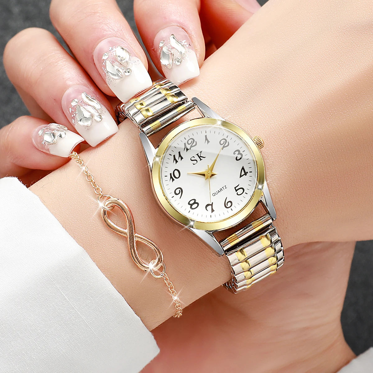 2PCS Two piece set of women's digital watch infinite symbol thin bracelet with gold stretch steel strip, not including gift box Qme