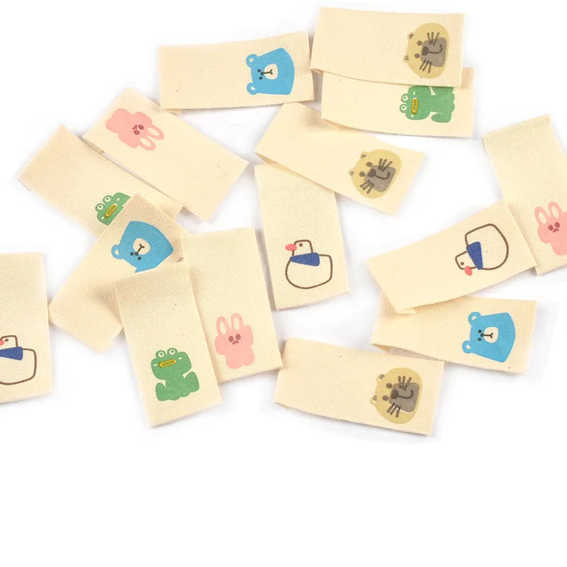 50pcs 20x40mm Cartoon Animals Printed Beige Label DIY Decor Clothes Backpack Supplies Sewing Accessories Handmade Crafts c4147 Qme