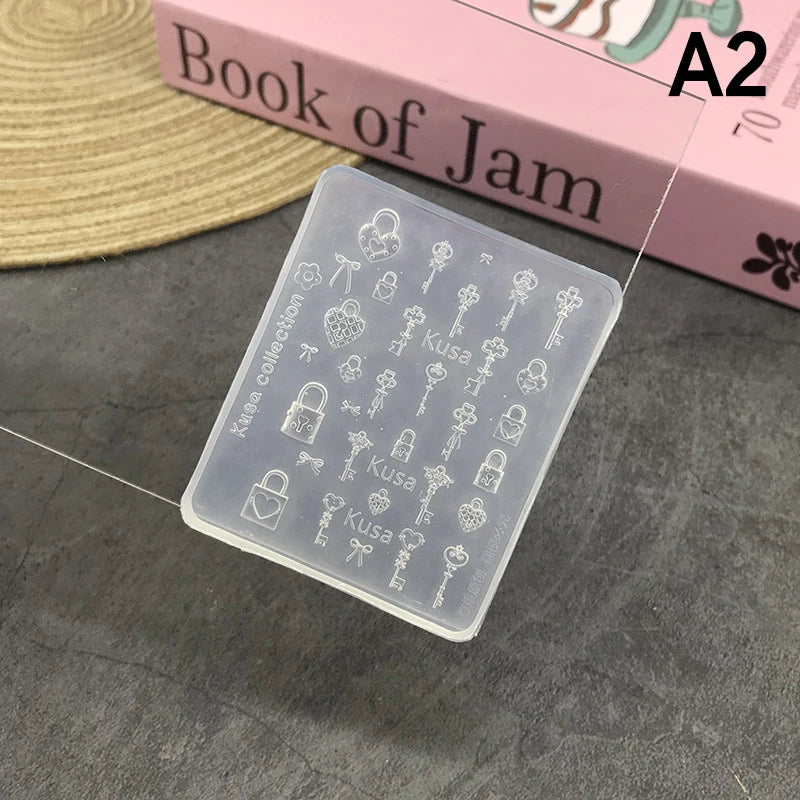 Cartoon Butterfly Button Key Lock Silicone Nail Stamping Mold Qme A2