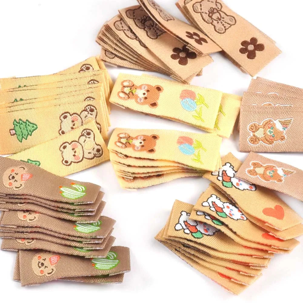 50Pcs Kawai Bear Embroidery Brown Labels For Knitted Hats Bag Shoes Sewing Garment Accessories DIY Tags Crafts Handmade Supplies Qme