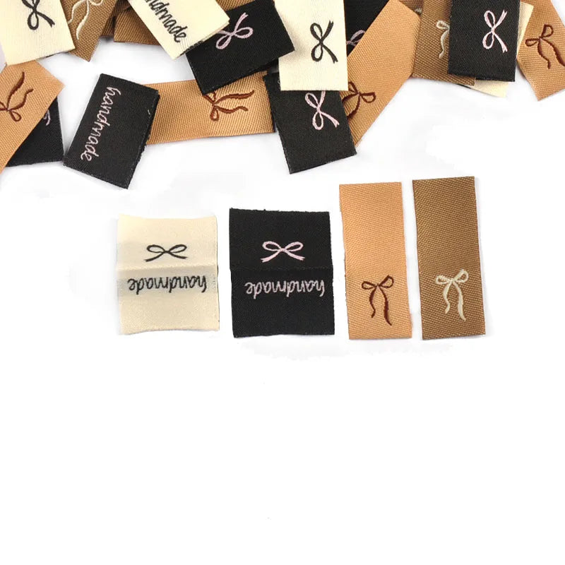 50pcs 15-38.5mm Rectangle Brown/White/Black Bow Label Embroideried Clothes Backpack Sewing Accessories Handmade Crafts c3784 Qme