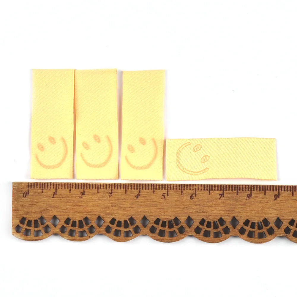 50Pcs New Candy Color Embroidery Smile Labels For Sewing Accessories Clothes Washable Care Garment Bags Tags DIY Supplies c3513 Qme 3