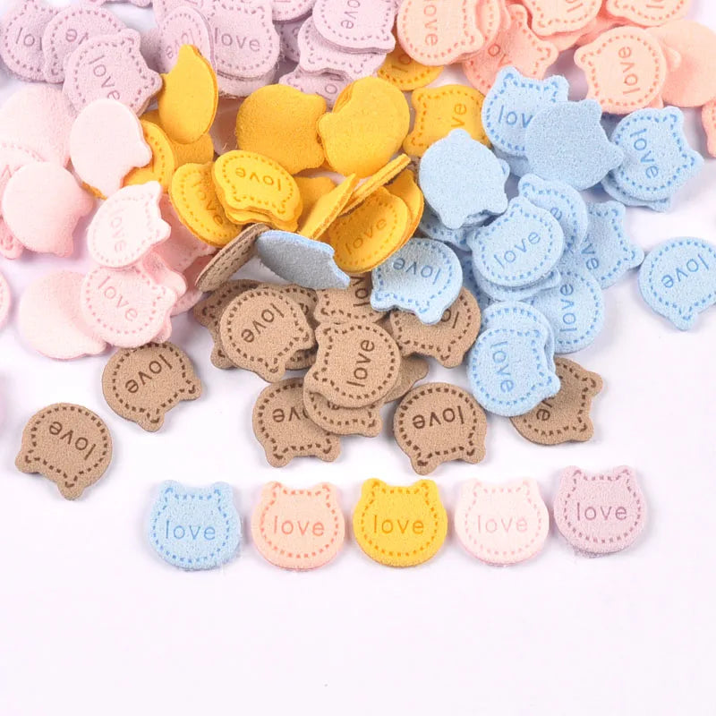 50Pcs Love Letter Cat Embossing Leather Labels For Clothes Sewing Accessories Garment DIY Crafts Supplies Kid Hats Shoes Tags Qme