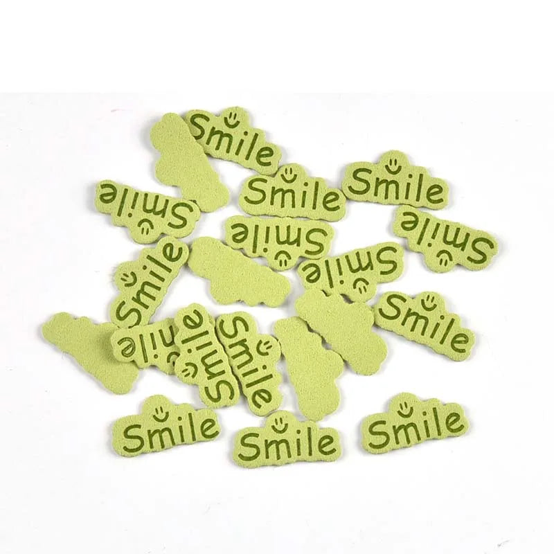 30pcs 14.5x29mm Smile Letter Embossed Leather Labels For Clothes Sewing Accessories DIY Bag Kid Garment Craft Handmade Tag C3707 Qme 4