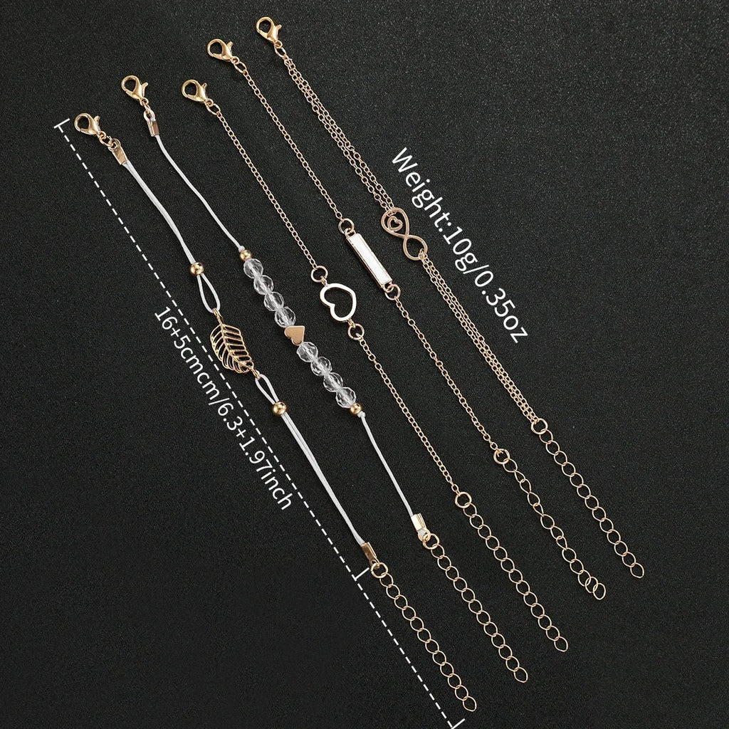 Women Rose Gold Rhinestone Flower Dial Quartz Wrist Watch with 5Pcs Stackable Heart Leaf Charm Bracelets Jewelry Set Qme
