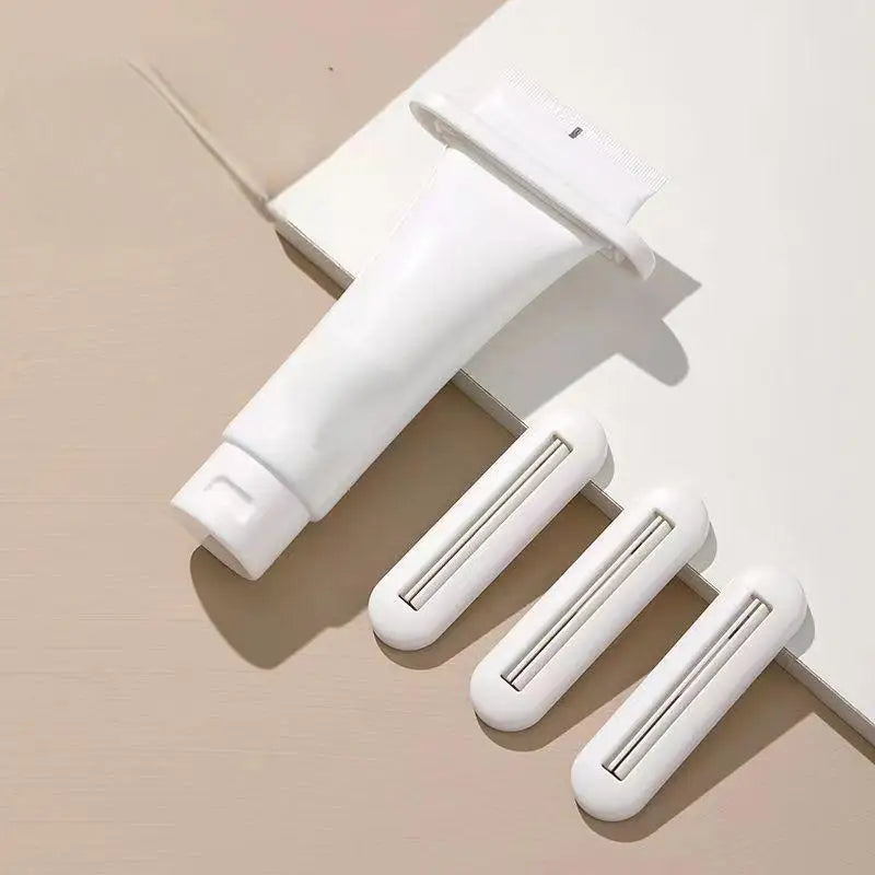 Toothpaste Squeezer, Toothpaste Clip, Facial Cleanser Hand Cream Squeezer, Household Manual Toothpaste Rolling Squeezer Qme