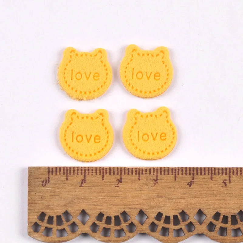 50Pcs Love Letter Cat Embossing Leather Labels For Clothes Sewing Accessories Garment DIY Crafts Supplies Kid Hats Shoes Tags Qme 2