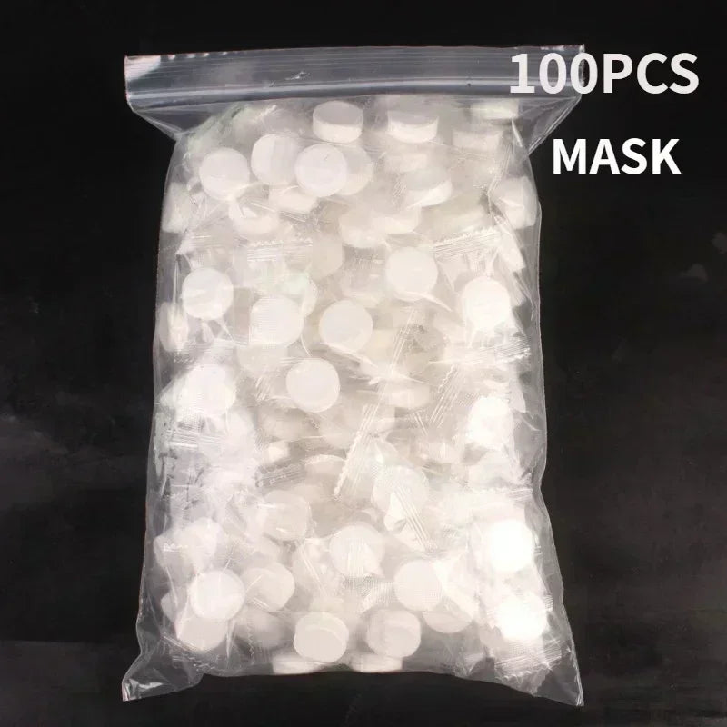 100pcs Disposable Compressed Facial Mask Portable Travel Non-woven Face Mask Skin Care Cotton Wrapped Masks Paper Qme