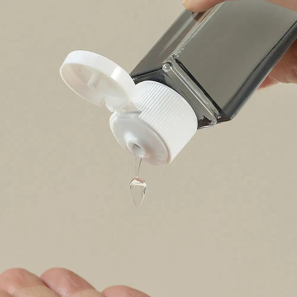 Refillable Travel Dispenser Bottle 4in1 Combination Shampoo Qme