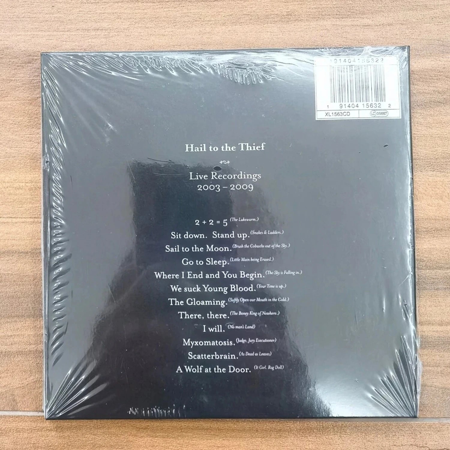 Limited Release Rock Live Recordings Compilation CD Album, Featuring Multiple Live Versions, Capturing The Band's Stage Charm Qme