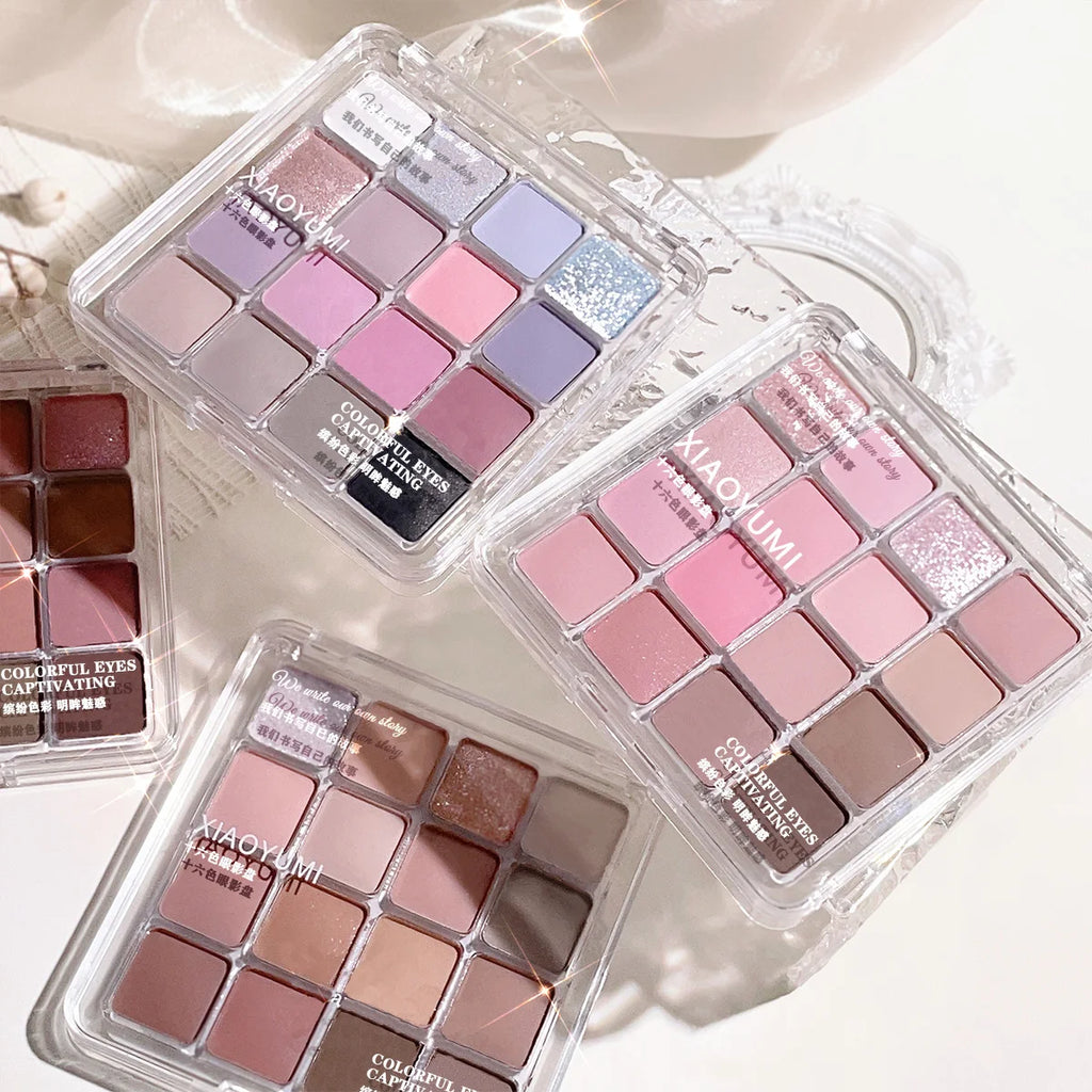16 color eyeshadow palette - Glitter, matte and shimmer finish in gentle fall and winter tones of blue, brown, coral and pink Qme