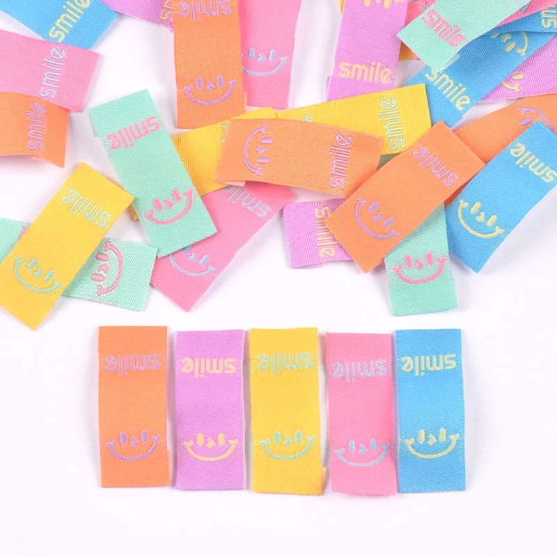 50Pcs Colorful Smile Embroidery Colth Labels Garment Washable Care Tags Sewing Accessories Crafts DIY Knitting Bag Shoe Supplies Qme