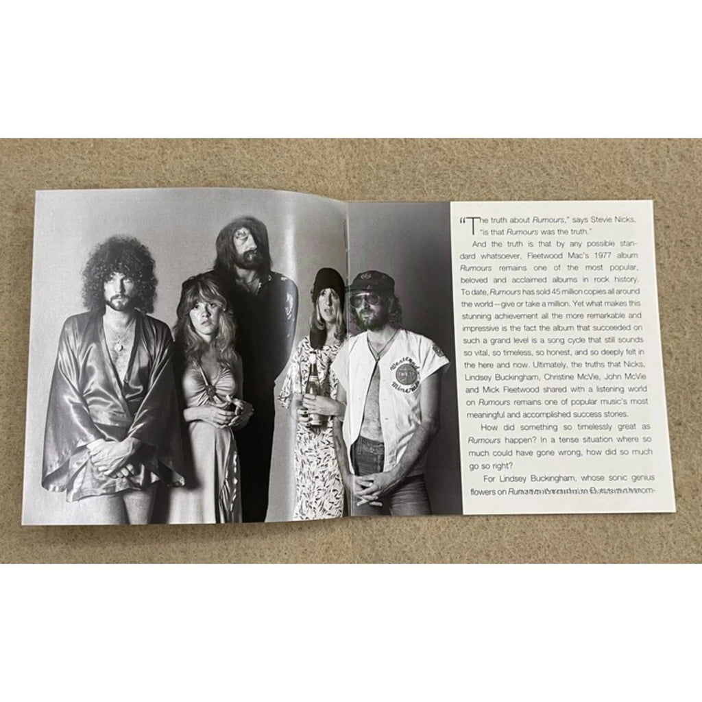 Rock Music CD Album with Retro Black-and-White Couple Silhouette Cover Elegant Design & Classic Tracks Creating A Nostalgic Vibe Qme