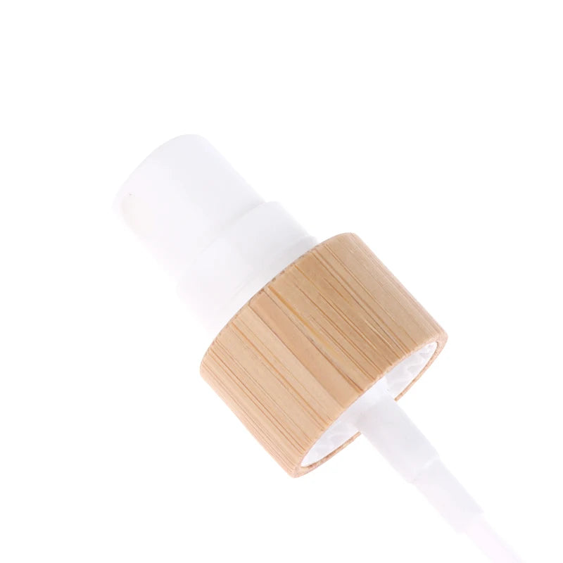 Bamboo Plastic Skincare Packaging Bottle Pump Lids Eco Friendly Qme