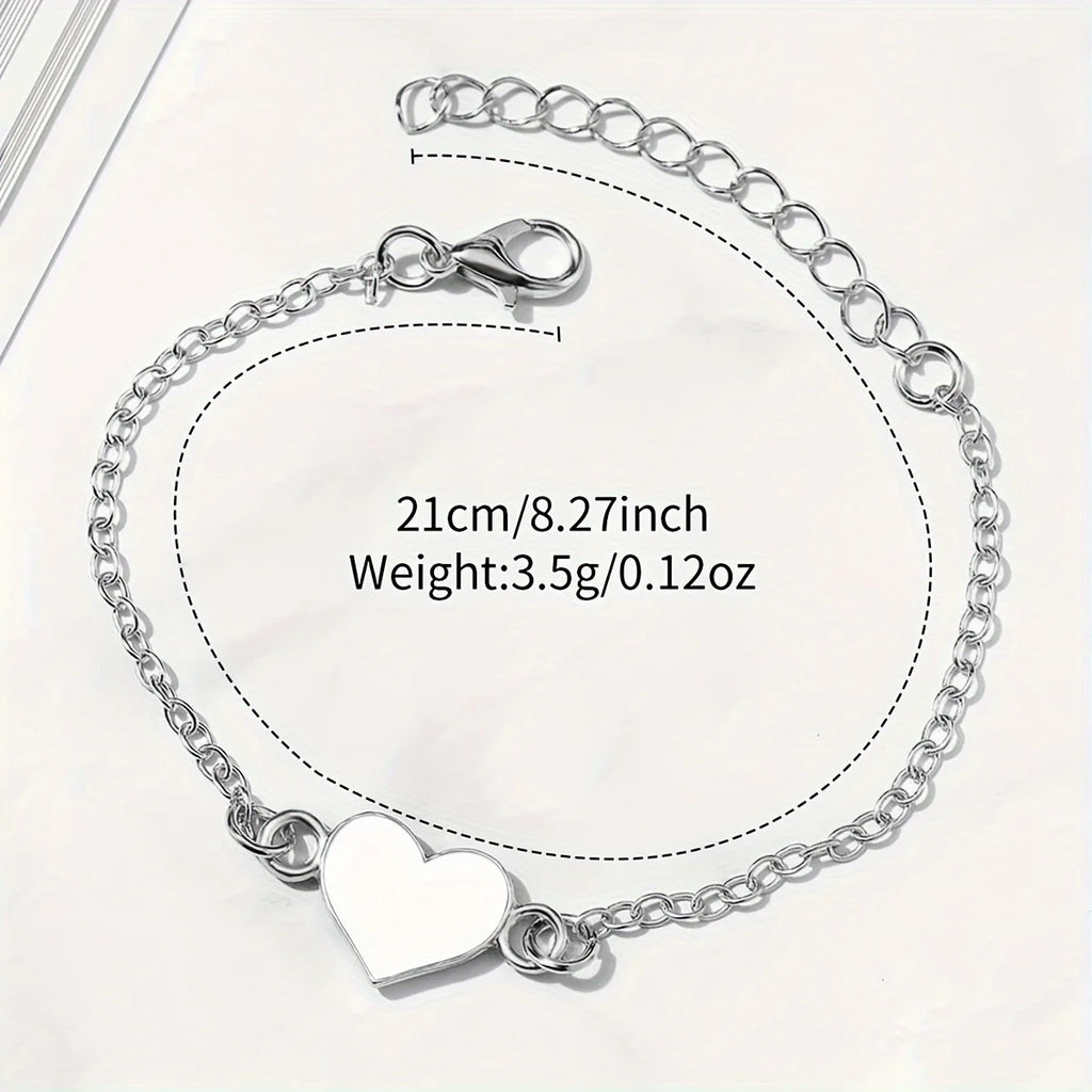 Silver hollowed out large dial, white belt, ladies' quartz watch, heart-shaped fine bracelet, two-piece set Qme