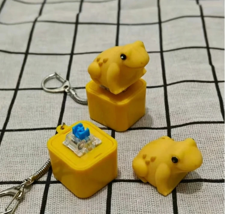 Rechargeable Croaking Frog Keyboard Fingertip Button Keychain LED Qme