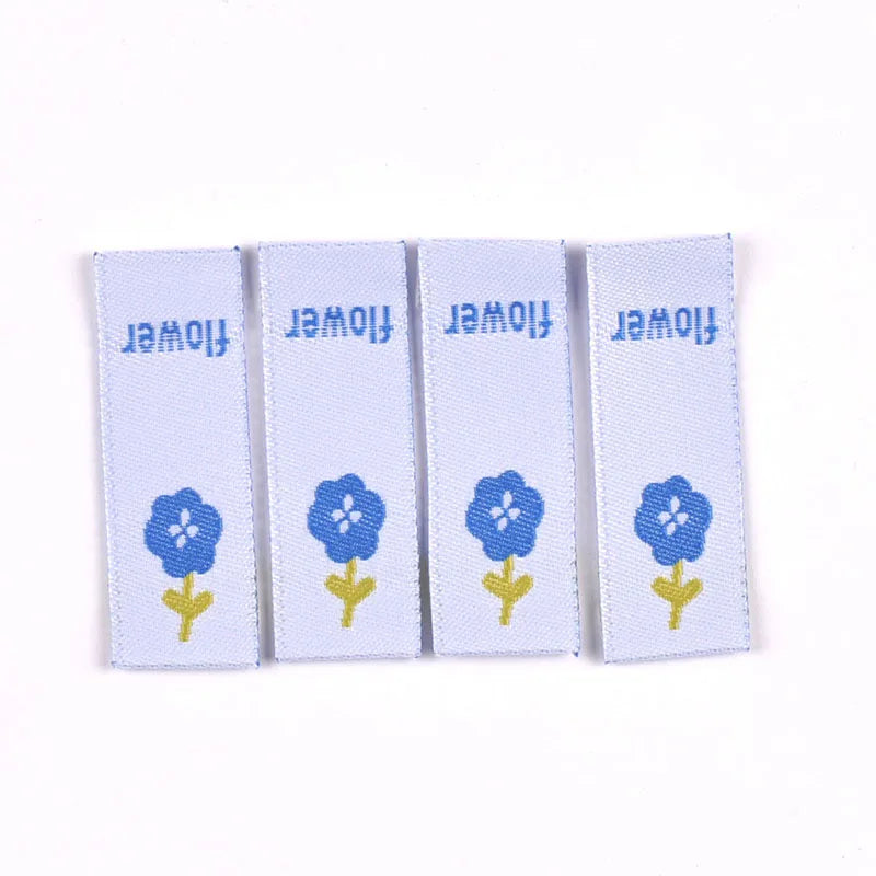 50pcs Cute Flower Embroidery Labels DIY Garment Accessories Handmade Clothing Bag Shoes Tags Kids Sewing Crafts 41x15mm c3630 Qme 6