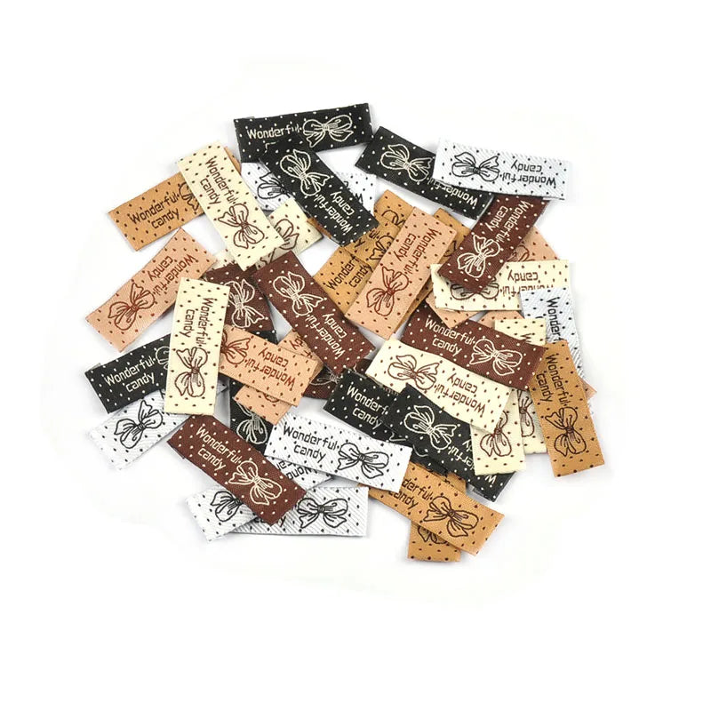 50pcs 41x15mm Mixed 6 Colors Rectangle Bow Dot Pattern Clothes Labels Sewing Supplies DIY Bags Shoes Hats Handmade Fabric c3783 Qme