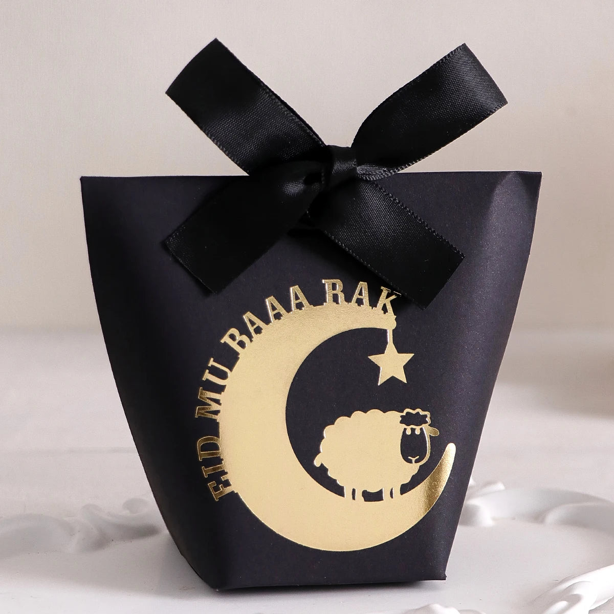 10 Elegant Black, White, and Green Eid Al-Adha Gift Boxes, Decorated with Creative Golden Crescent Lanterns and Lamb Motifs Perfect for Holding Candies, Chocolates, and Small Gifts. It Is a Celebration of the Eid Al-Adha. Qme Black-Black-10 Pcs Other Other