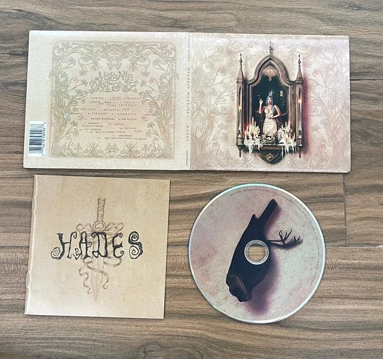 Avant-Garde Dark CD Album, Gothic-Infused Alternative Pop with Dramatic Production, Emotional Vocals and Ethereal Storytelling Qme