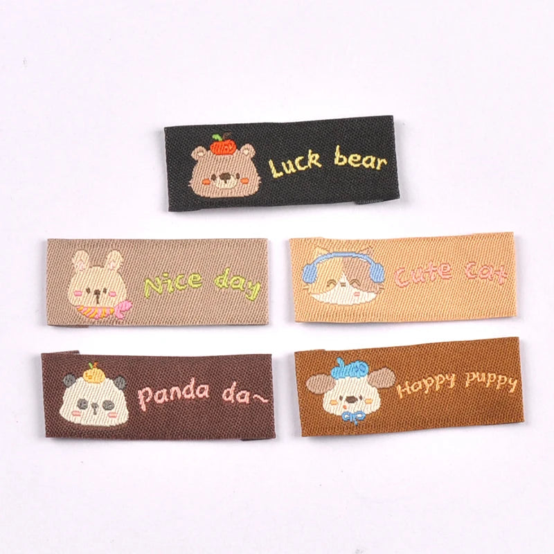 50Pcs Mix 40x17mm Cute Animal panda/dog/cat Fabric Labels Sew On Tags for DIY Clothes/Bag/Shoes Crafts cp4314 Qme 40x17mm-mix